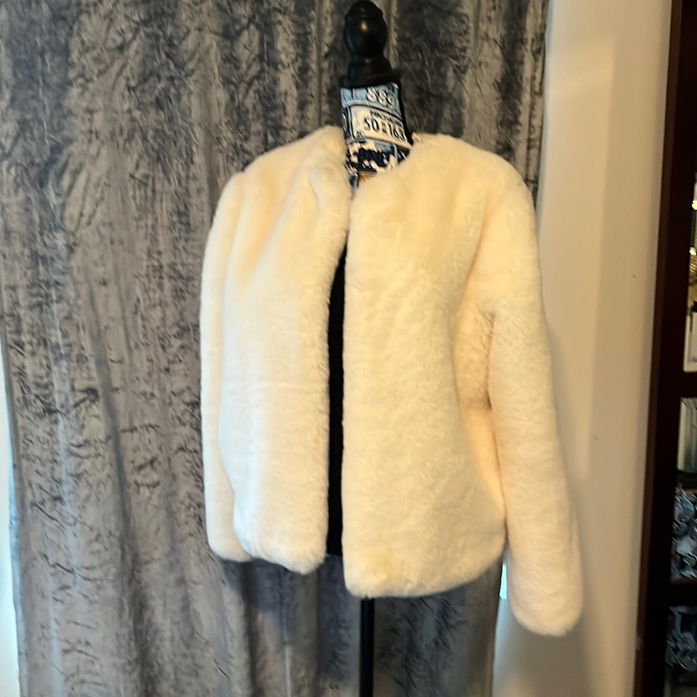 white faux fur coat..size L